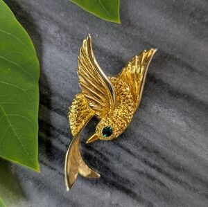 Gold Bird Brooch with Green Gem Eye